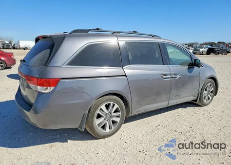 2014 Honda Odyssey Touring z USA, uszkodzony, nr VIN 5FNRL5H94EB009890